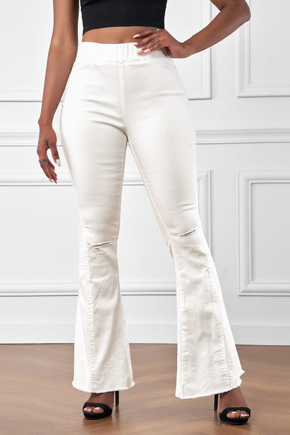 Pantalones de mezclilla con parte inferior de campana desgastada multicolor