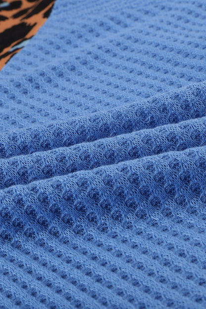 Top de punto con patchwork de leopardo colorblock