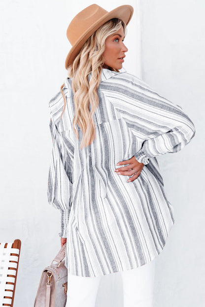 Chemise boutonnée rayée à poches et fentes 