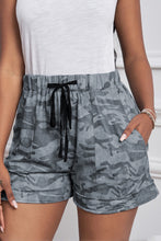 Pantalones cortos con bolsillos en la cintura elástica casual con cordón estampado