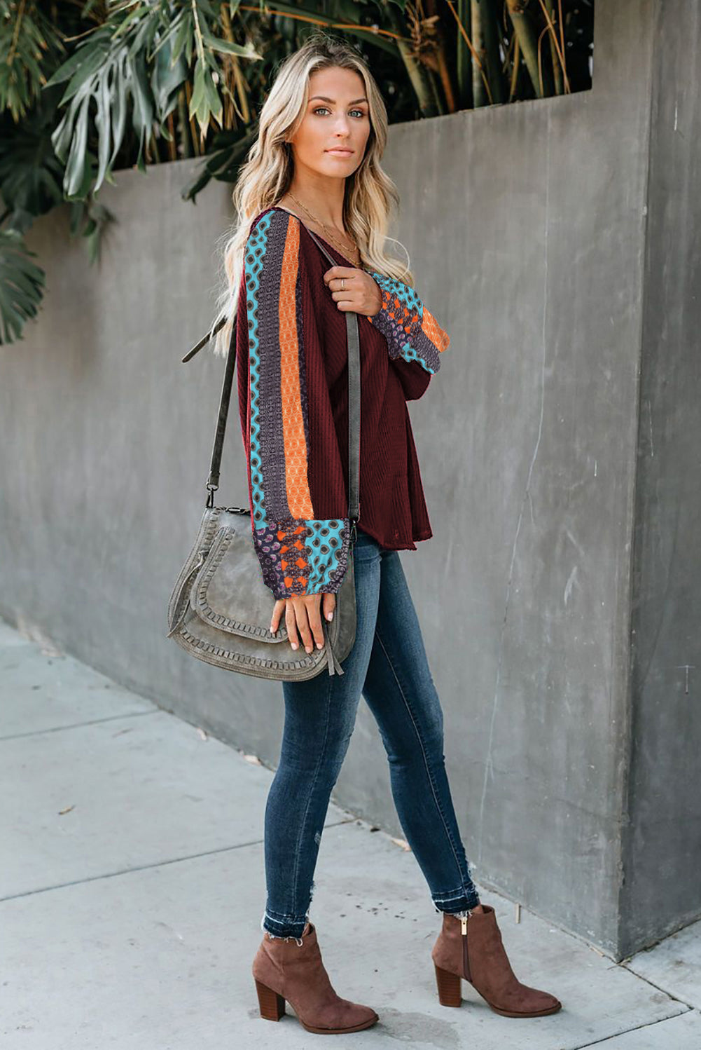 Blusa de punto gofrado con empalme de leopardo