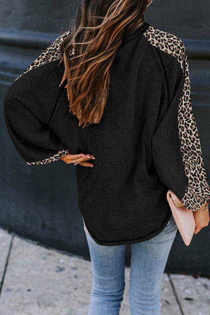 Blusa de punto gofrado con empalme de leopardo