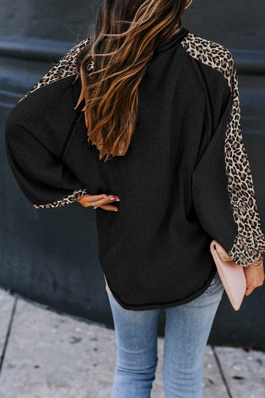 Blusa de punto gofrado con empalme de leopardo