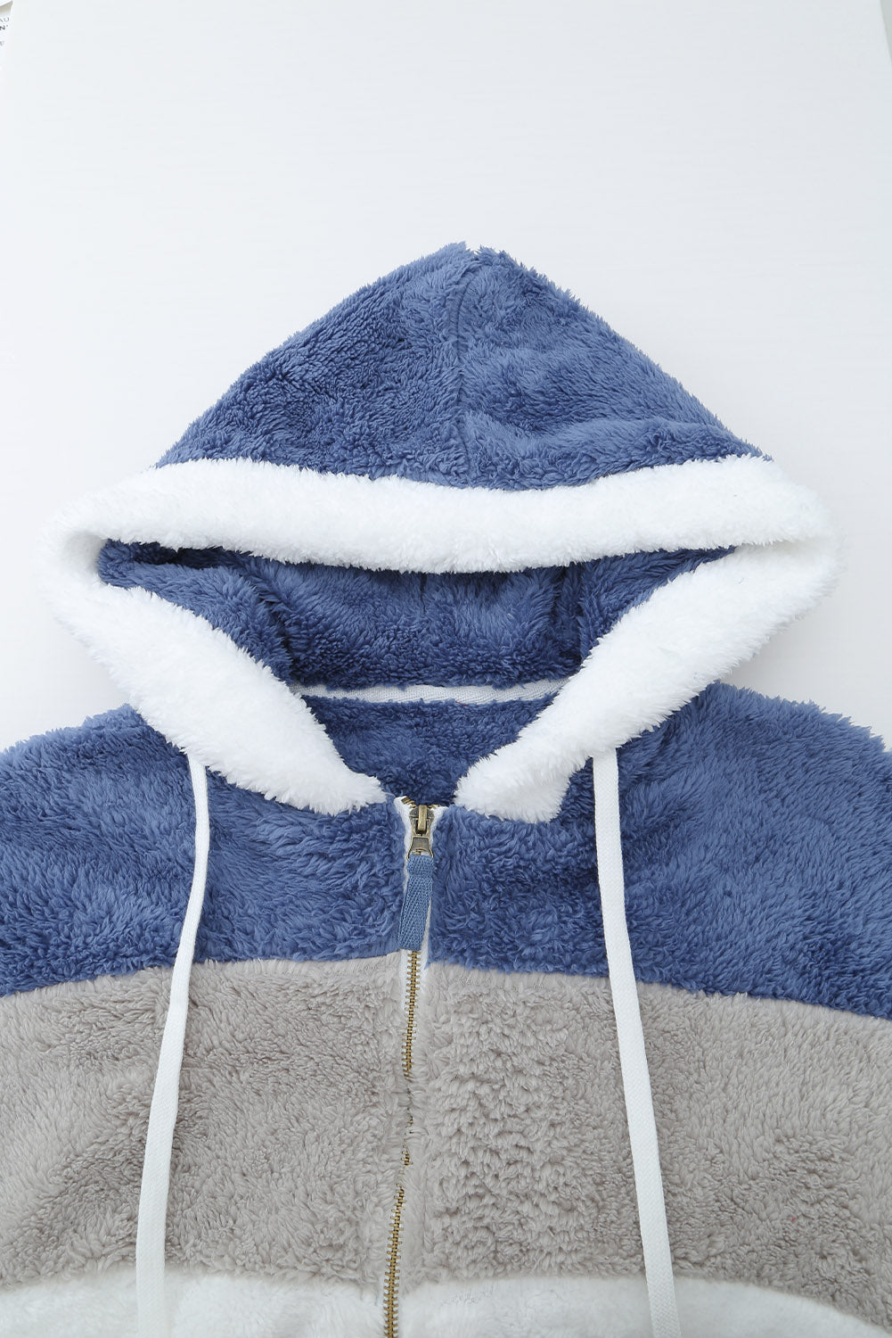 Abrigo sherpa con cremallera y bloques de color rojo vino con capucha 