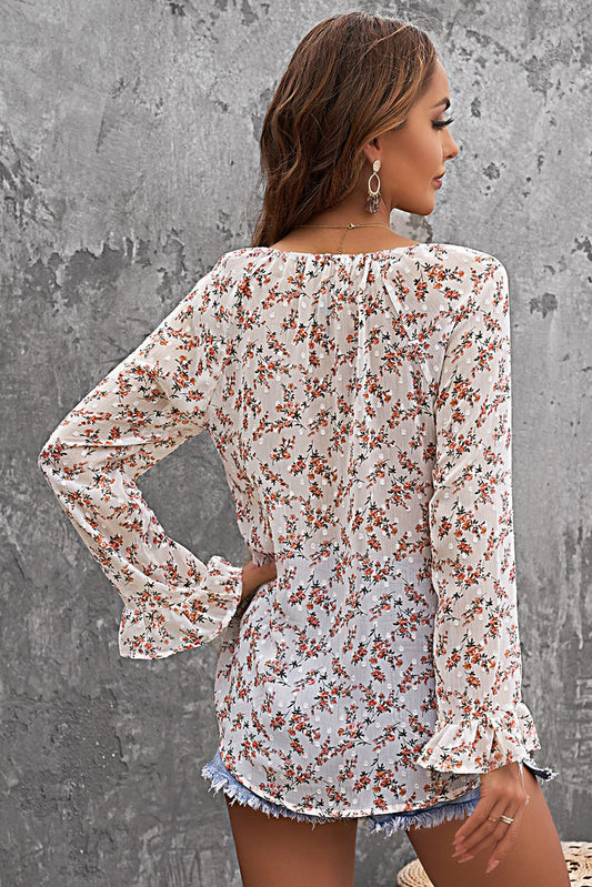 Blusa de manga larga con cordón y estampado floral