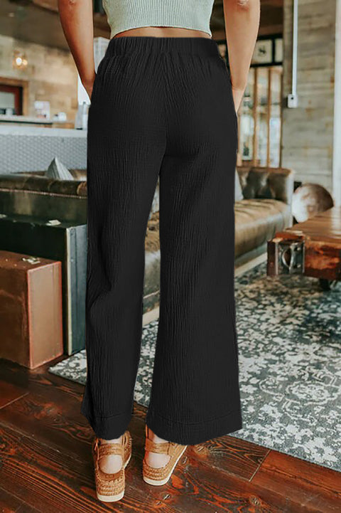 Pantalones de pierna ancha arrugados con cordón en la cintura de color caqui
