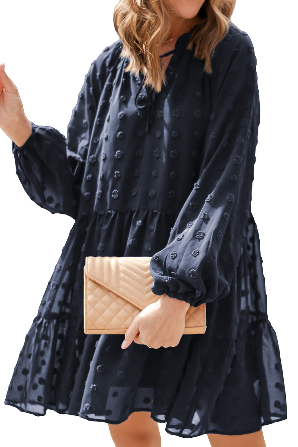 Mini-robe bleu foncé à manches longues bouffantes en maille à pois suisses