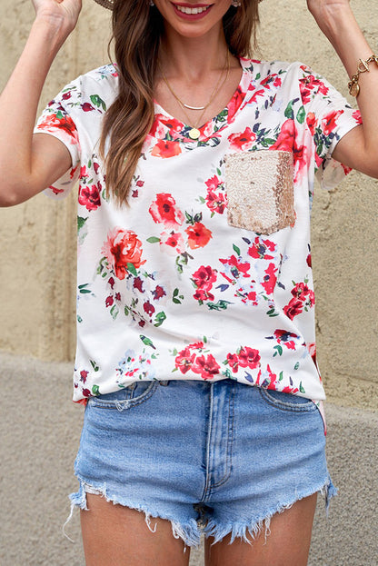 Camiseta floral con cuello en V y bolsillo de lentejuelas
