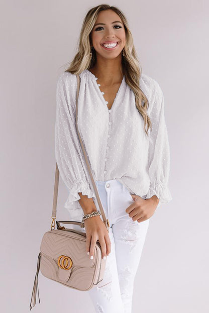 Chemise à pois suisses à boutons amples 