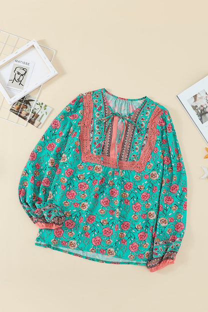 Chemisier fleuri à col en V et manches lanternes