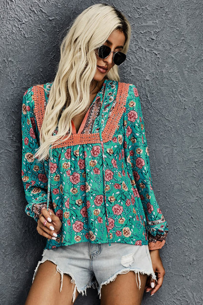 Chemisier fleuri à col en V et manches lanternes