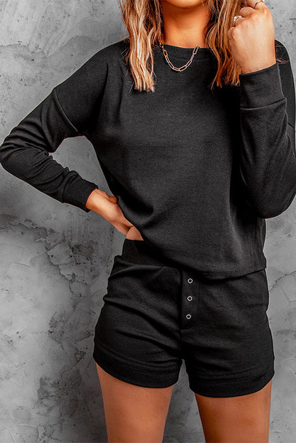 Ensemble deux pièces haut à manches tombantes et short en tricot côtelé gris