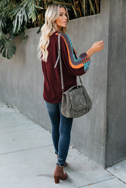 Blusa de punto gofrado con empalme de leopardo