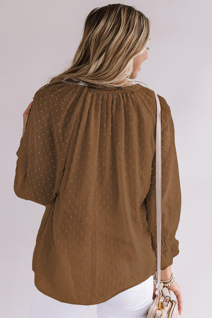 Chemise à pois suisses à boutons amples 