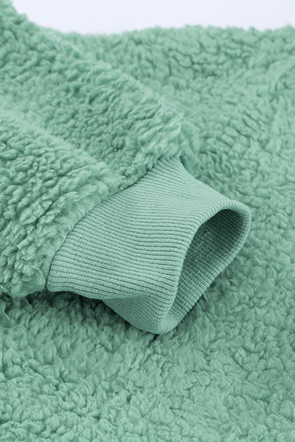 Sweat-shirt à capuche zippé 1/4 en sherpa avec kangourou