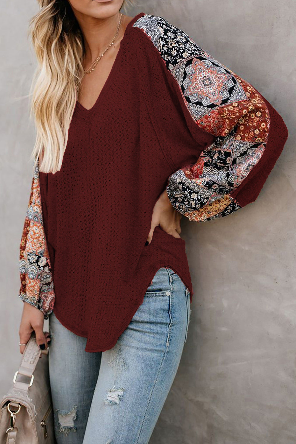 Blusa de punto gofrado con empalme de leopardo