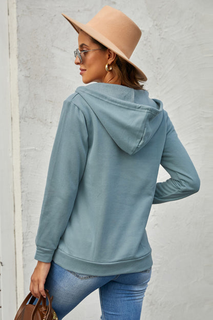 Sweat à capuche à manches longues et demi-fermeture éclair avec poche 