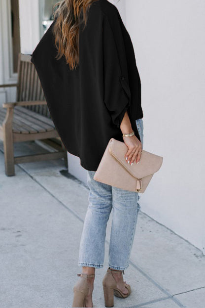 Camisa con cuello en V y manga 3/4 con dobladillo alto y bajo