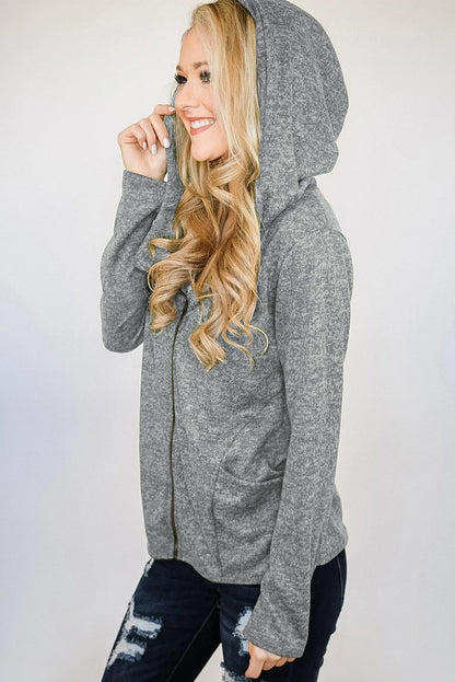 Abrigo tipo cárdigan con cremallera y capucha 
