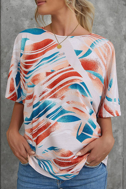 Top dolman fluido con estampado tie-dye
