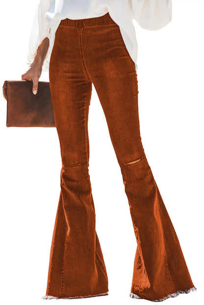 Pantalones de mezclilla con parte inferior de campana desgastada multicolor