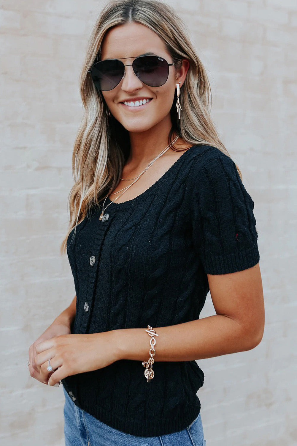 Top caqui de punto de ochos con botones y manga corta