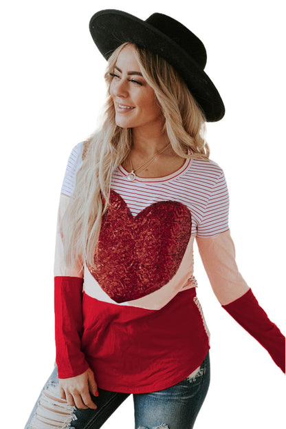 Haut rayé à manches longues et paillettes en forme de cœur