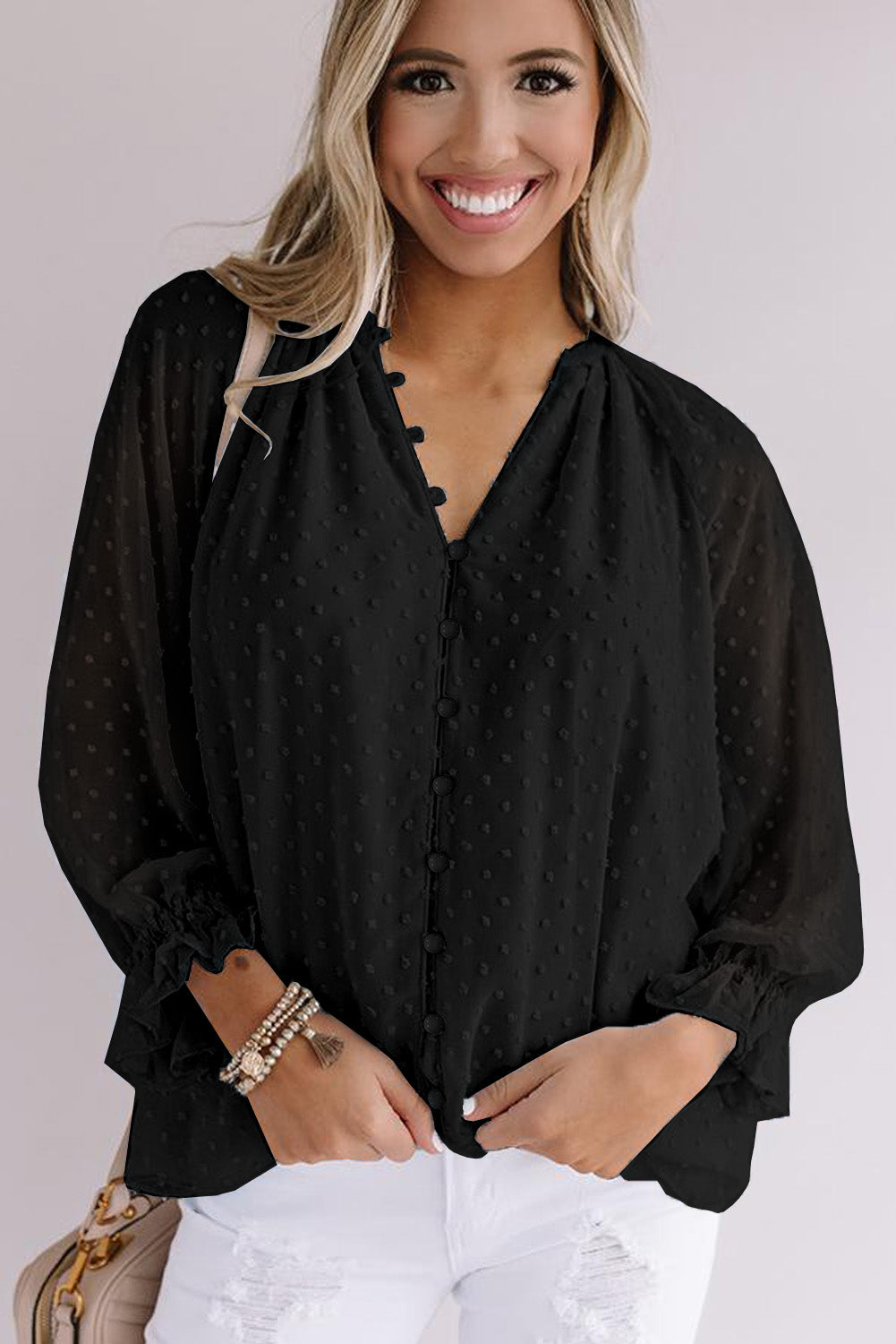 Chemise à pois suisses à boutons amples 