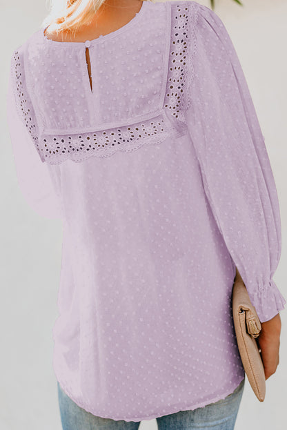 Blusa con mangas con volantes y lunares suizos