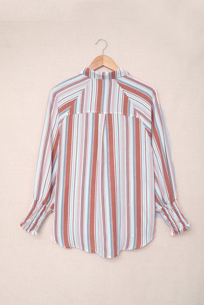 Chemise boutonnée rayée à poches et fentes 