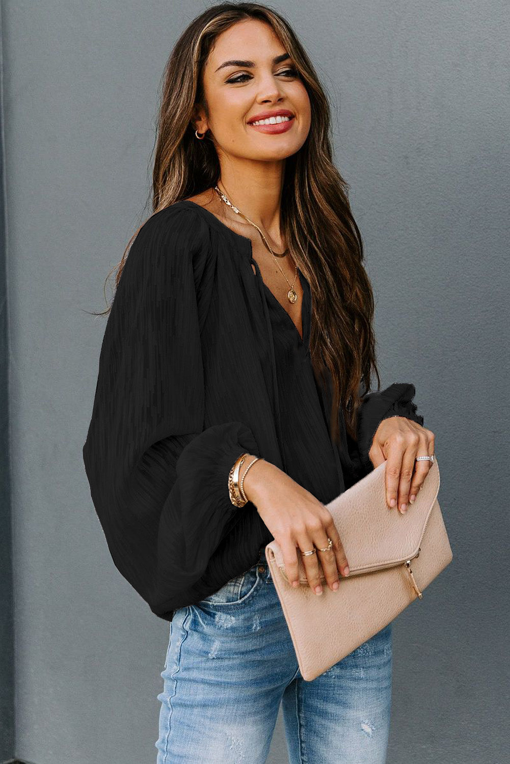 Haut uni texturé à col en V et manches lanternes 