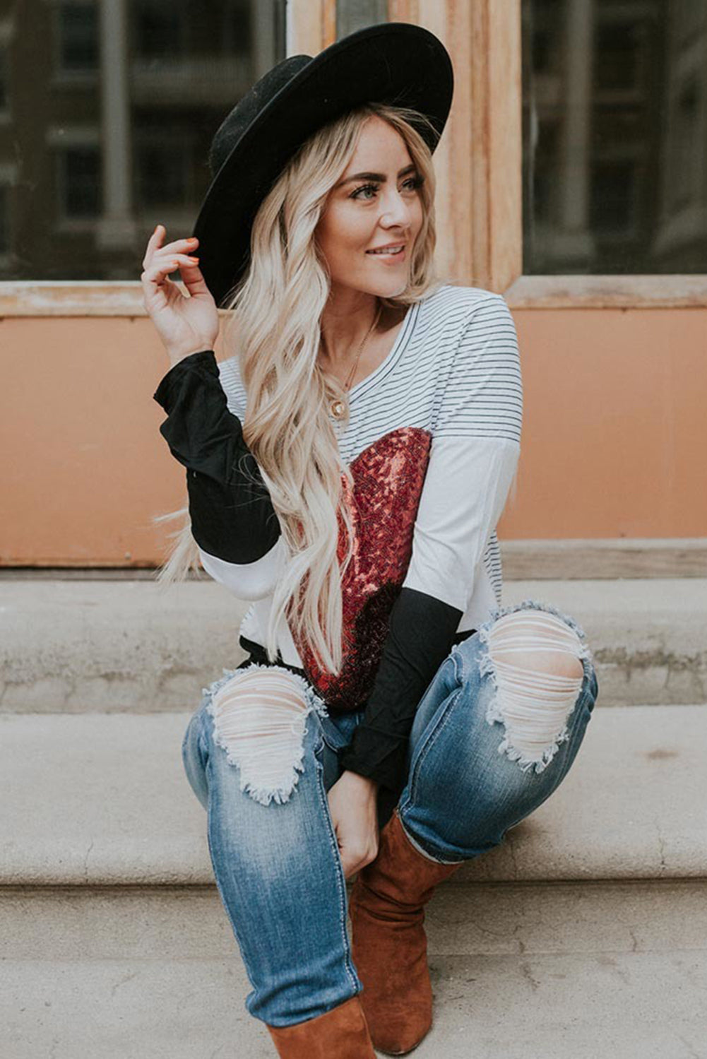 Haut rayé à manches longues et paillettes en forme de cœur