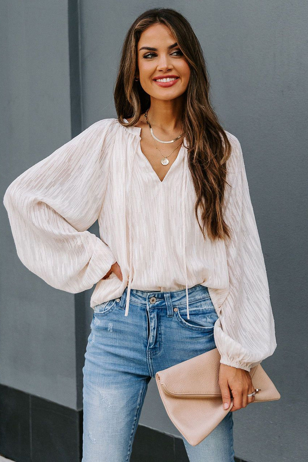 Haut uni texturé à col en V et manches lanternes 