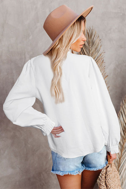 Blusa de manga larga con volantes y patchwork de encaje