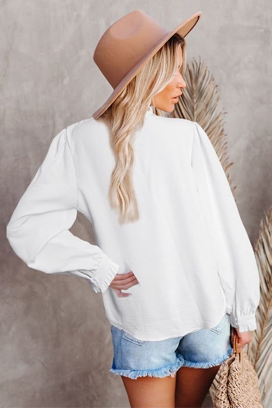 Blusa de manga larga con volantes y patchwork de encaje