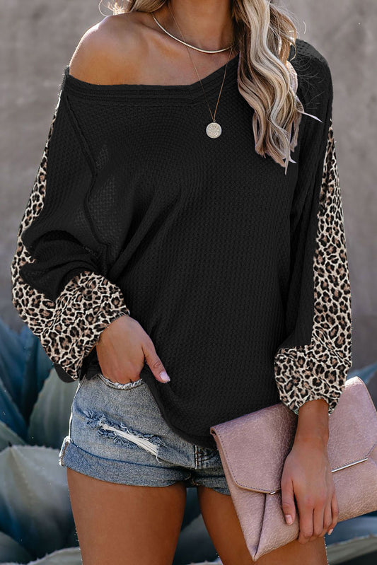 Blusa de punto gofrado con empalme de leopardo