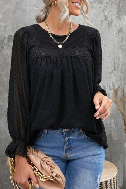Blusa con mangas con volantes y lunares suizos