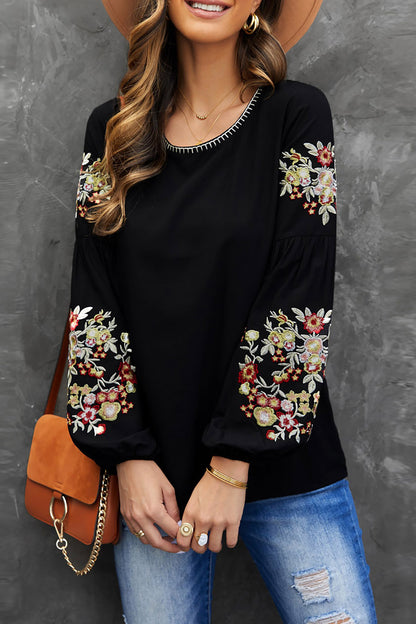 Top de manga larga con bordado floral