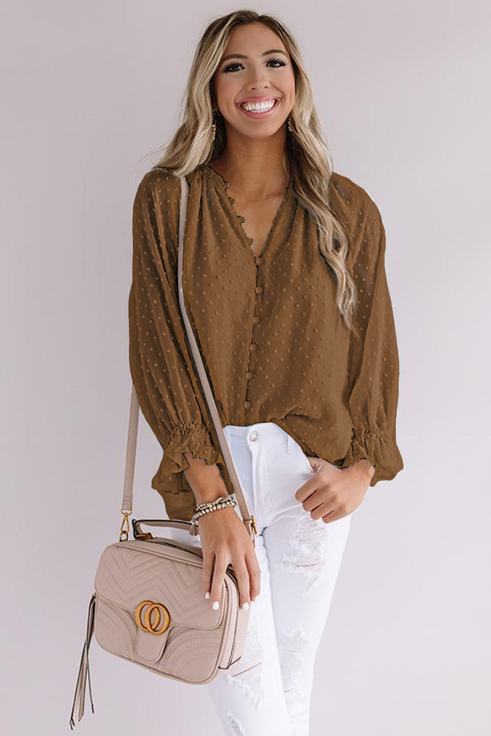 Chemise à pois suisses à boutons amples 