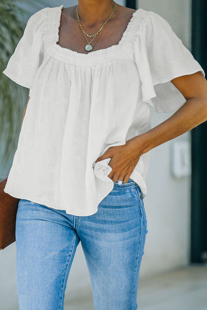 Haut à manches courtes et col carré en jacquard