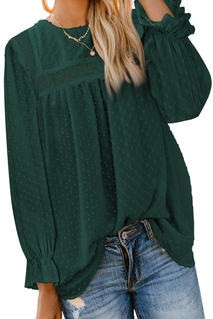 Blusa con mangas con volantes y lunares suizos