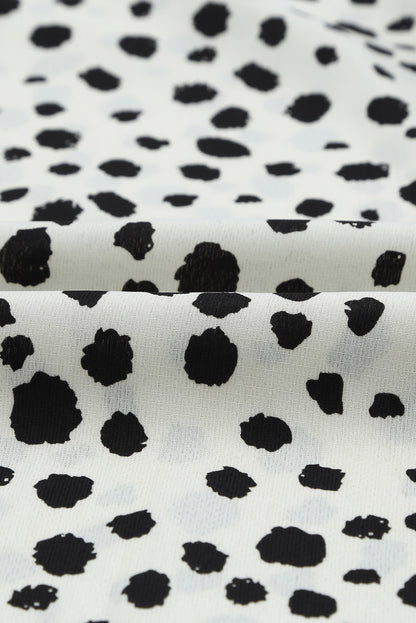 Blusa con manga farol y volantes de lunares