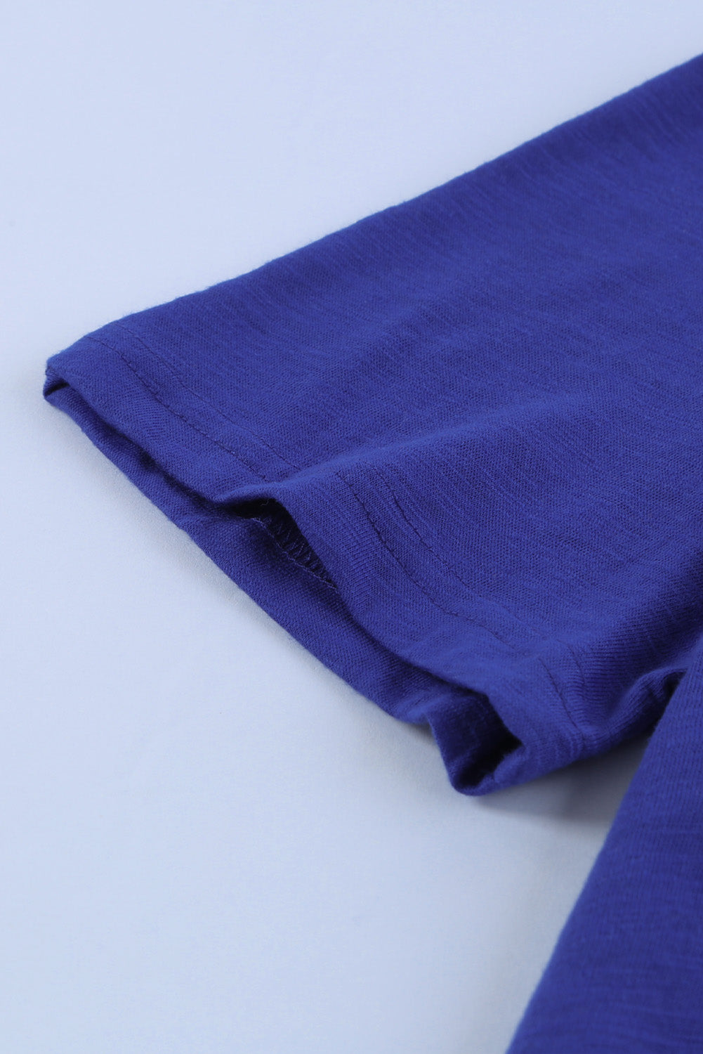 Camiseta mixta de algodón con cuello redondo y agujeros