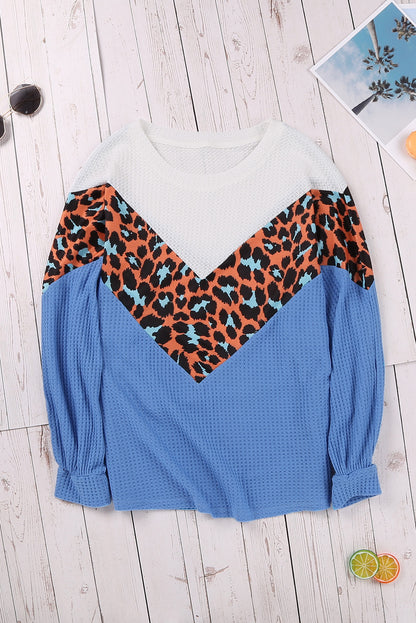 Top de punto con patchwork de leopardo colorblock