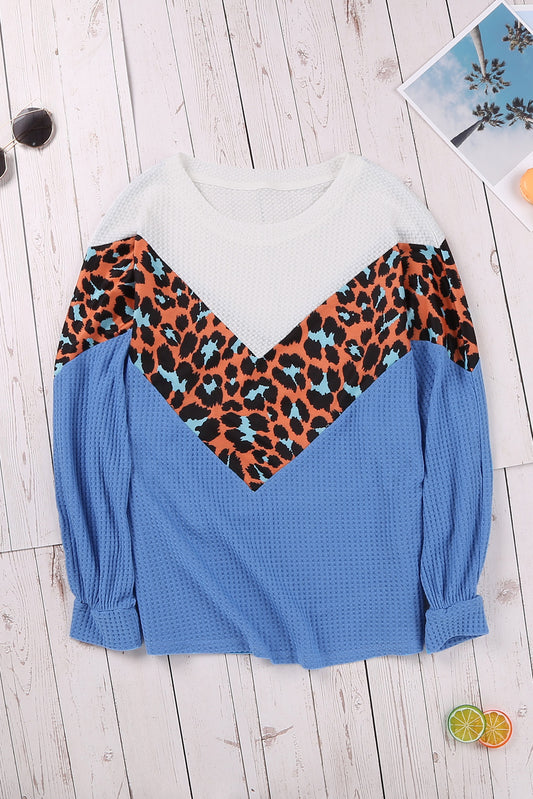 Top de punto con patchwork de leopardo colorblock