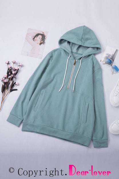 Sweat à capuche à manches longues et demi-fermeture éclair avec poche 