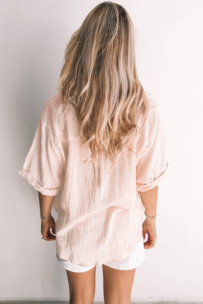 Camisa holgada de manga corta con botones y cuello en V 