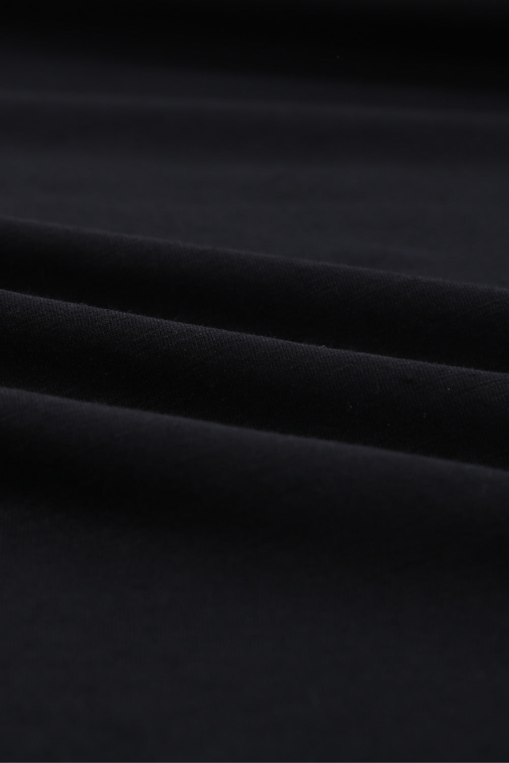 Camiseta mixta de algodón con cuello redondo y agujeros