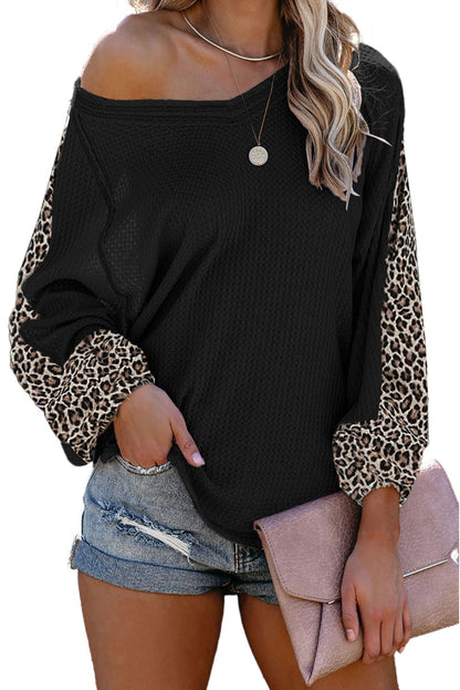 Blusa de punto gofrado con empalme de leopardo