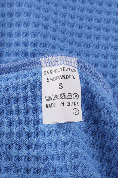 Top de punto con patchwork de leopardo colorblock